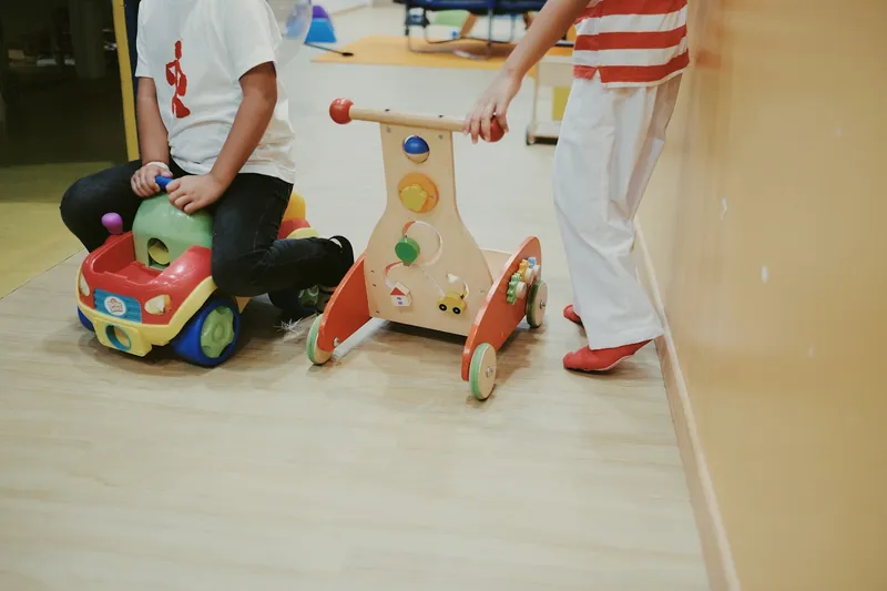 Toddlers playing in a nursery room