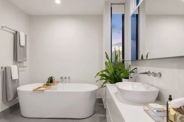 Full bathroom installation with freestanding bath
