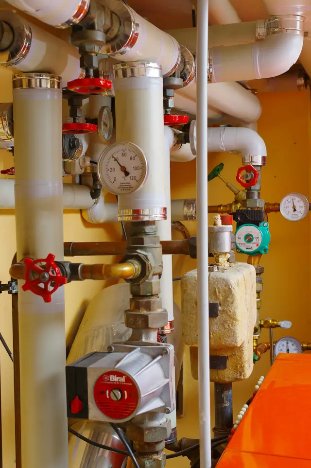 Boiler service with heating system gauges and valves