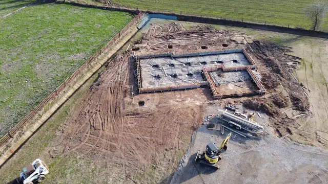 Excavator preparing foundations