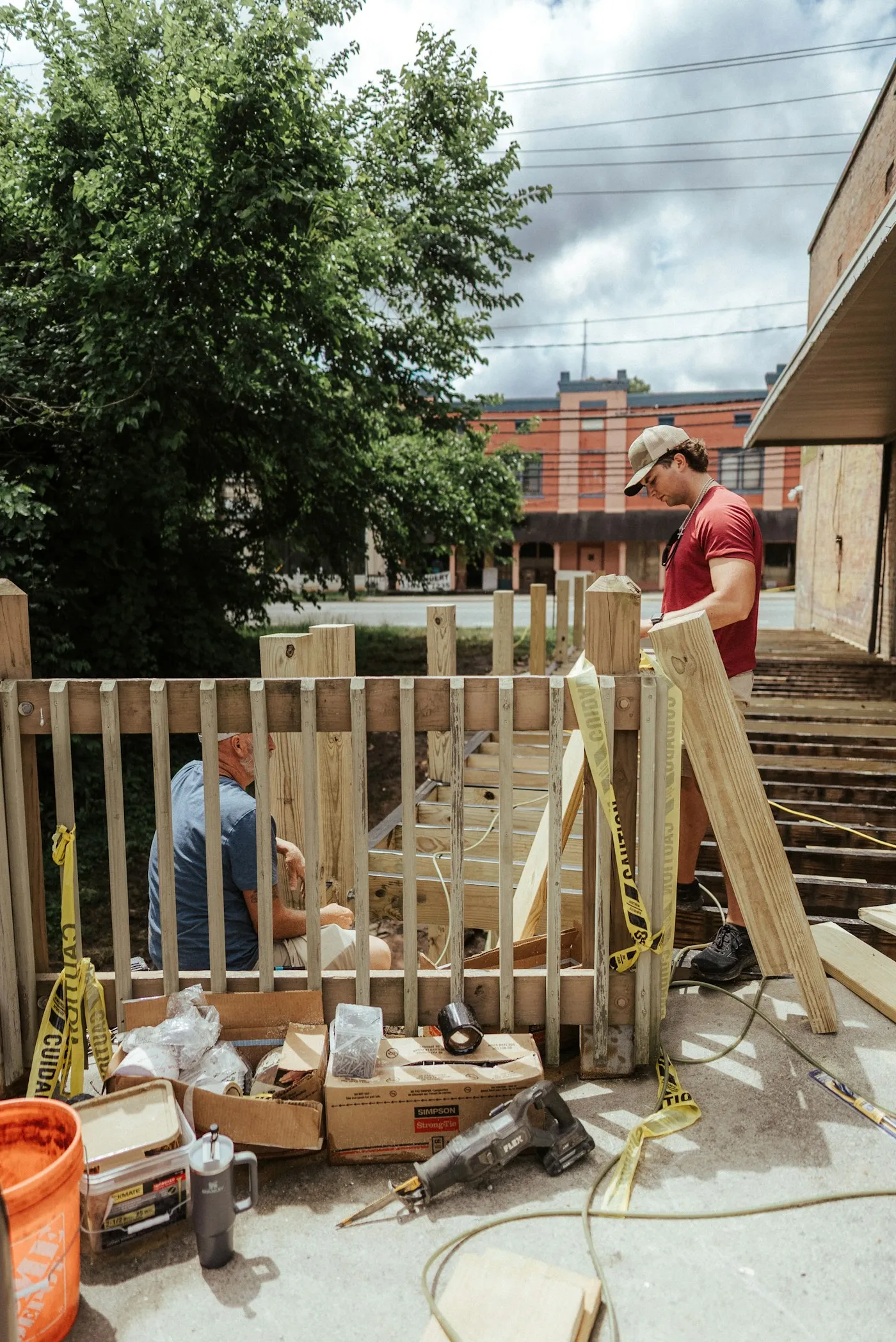 Fencing contractors building a garden fence