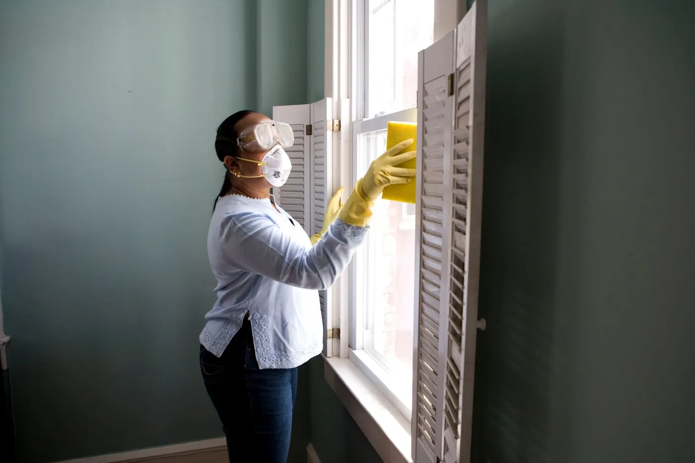 Professional cleaner working in a home