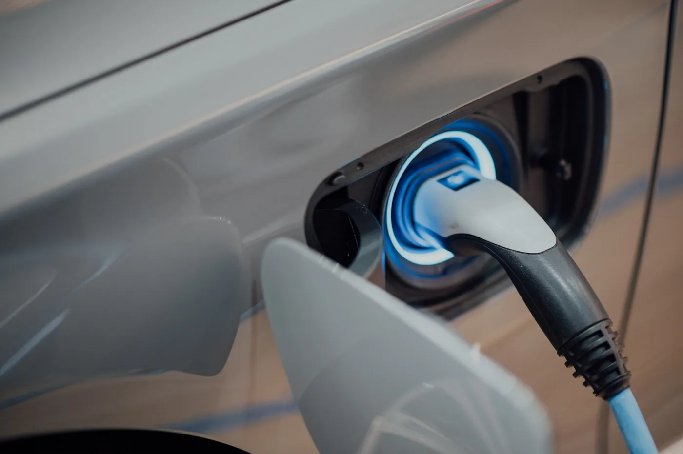 Electric vehicle plugged into a home charger
