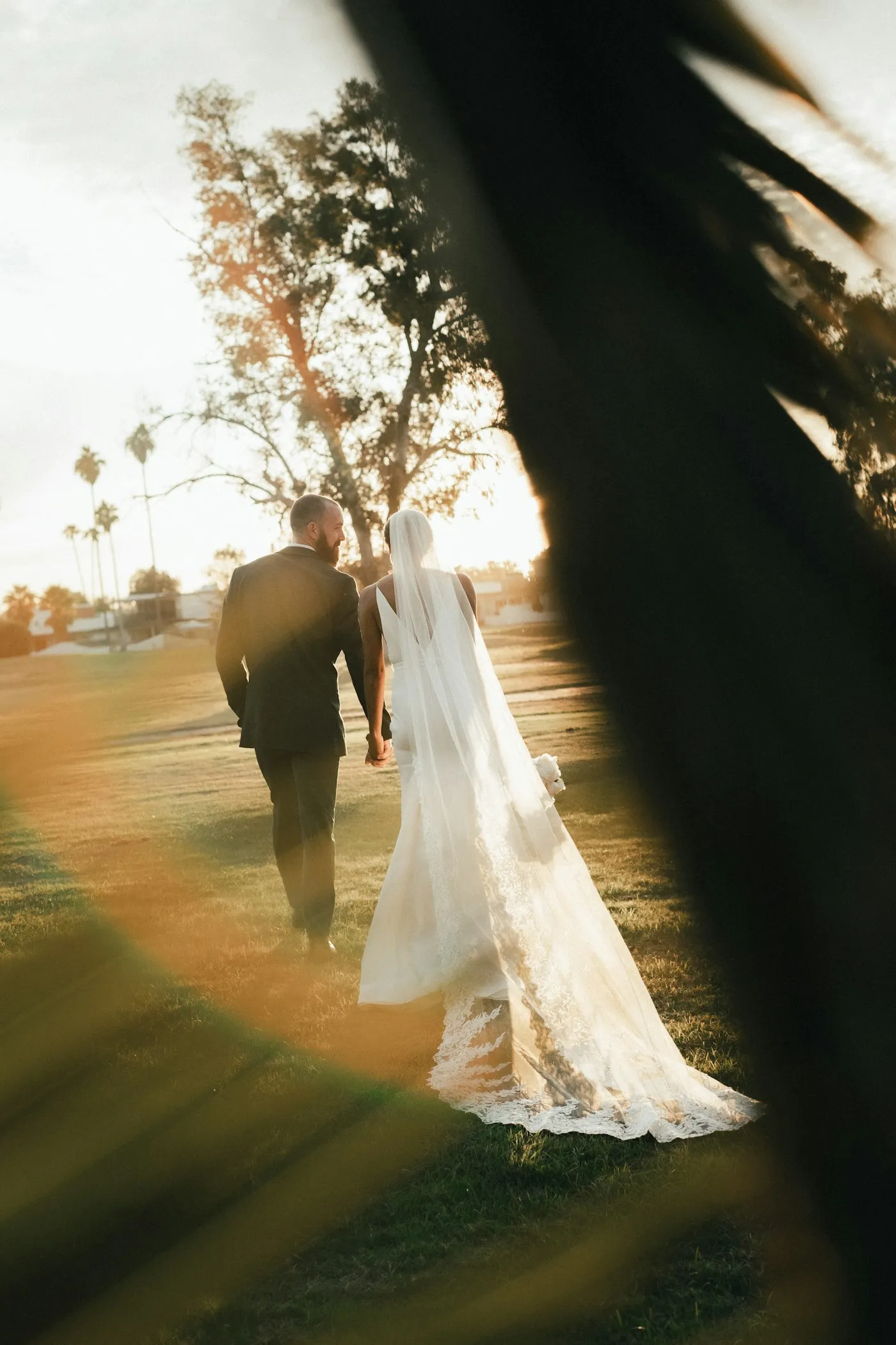 Wedding photographer capturing a couple