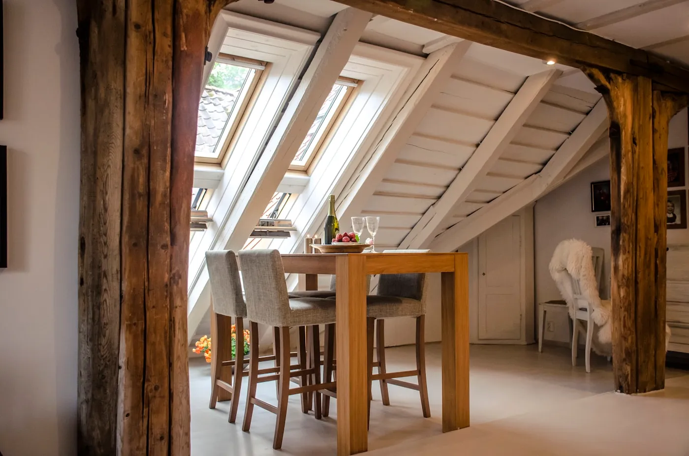 Finished loft conversion with Velux roof windows and sloped ceiling