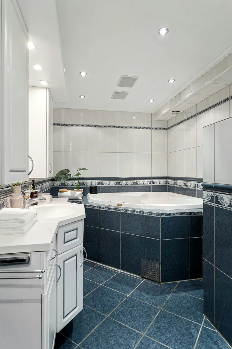 Tiled bathroom walls and floor