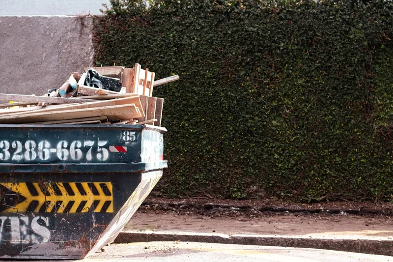 Large skip filled with building waste
